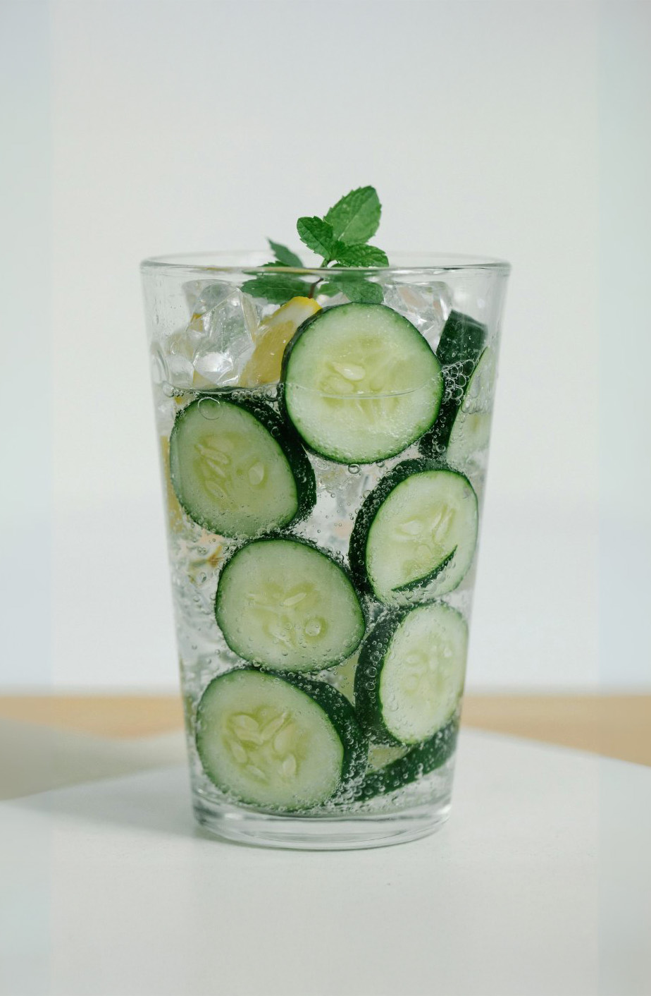 Tall glass of cucumber sparkling water, illustrating refreshing flavors and functional beverage production potential