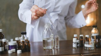 Flavor lab tech testing samples for clean, precise masking of plant-protein off-notes