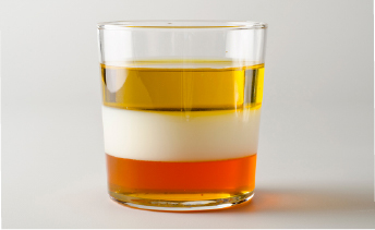 Layered beverage showing how flavors can unfold in sequence for balanced taste.