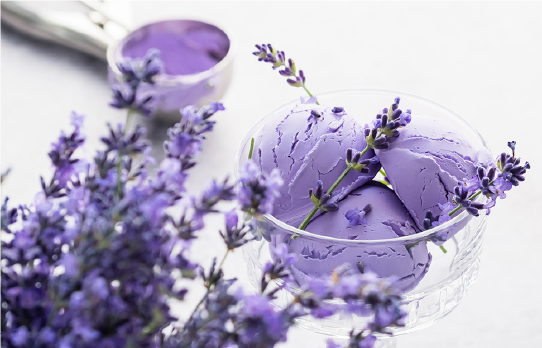 Lavender flowers and purple ingredients symbolizing innovation in stabilizing natural botanical flavors.