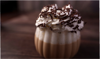 Plated dessert with blackberries, chocolate drizzle, and crisp tuile—showing layered flavors masking prebiotics off-notes